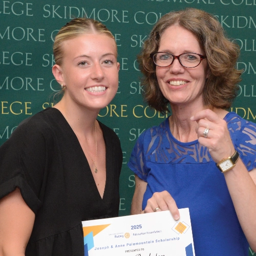 A Rotary Scholarship recipient with their award.